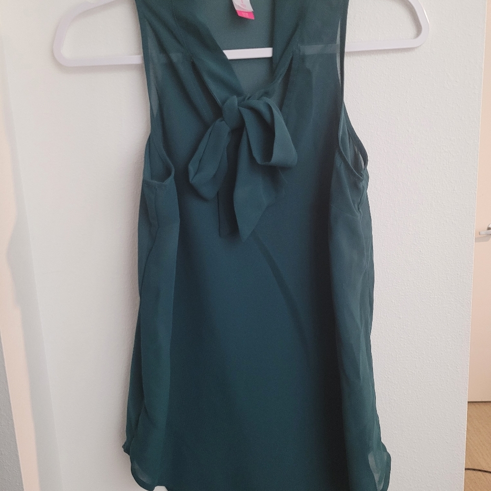 Sleeveless green blouse